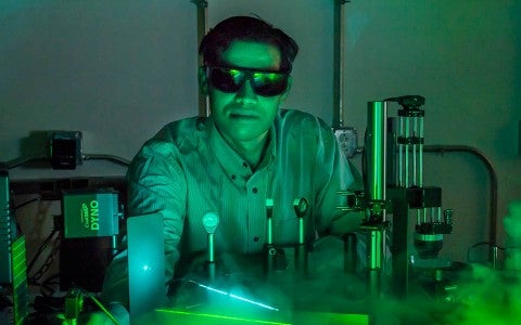 Gururaj Naik is developing technology to upconvert light by using lasers to power devices that combine plasmonic metals and semiconducting quantum wells. Photo by Tommy LaVergne